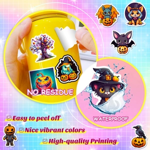 Detail of waterproof Halloween stickers with easy peel feature on a yellow cup
