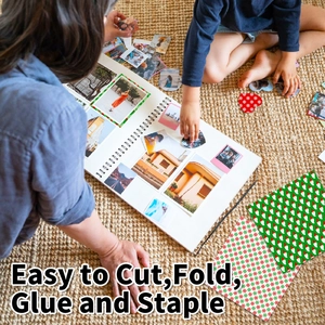 DIY Christmas scrapbook paper with festive patterns used for holiday album crafting