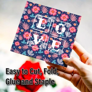 Detailed view of floral craft paper with LOVE text and easy to cut fold features