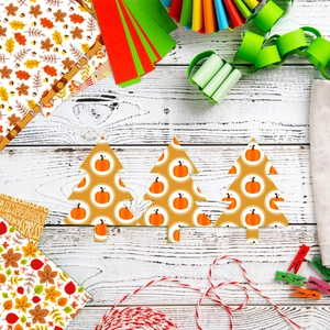 Mise à plat de papier scrapbooking d'automne avec formes de citrouille et feuilles