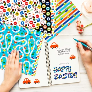 Detail of sea salt themed scrapbooking paper with vehicle motifs and decorative elements