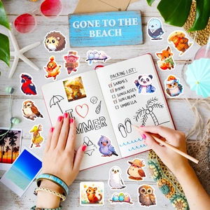 Close-up of cute cartoon owl and bear animal stickers on a beach themed background