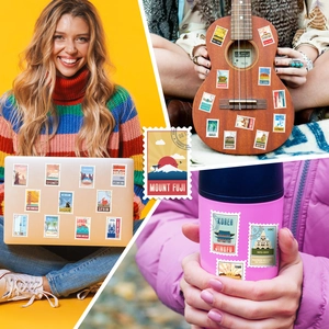 Detailed stickers showing world landmarks on a laptop, ukulele, and pink water bottle