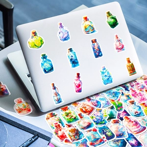 Creative fantasy bottle stickers with floral designs applied to a silver laptop case