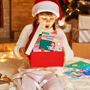 Kid opening a glowing gift box with educational concentration training sticker books