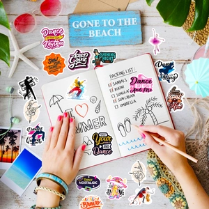 Flat lay of colorful waterproof dance stickers on white wood with summer accessories