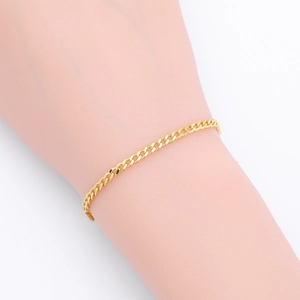 Classic gold S925 sterling silver curb chain bracelet shown on a wrist for daily wear
