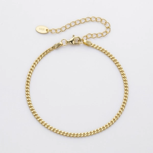 Close-up of S925 sterling silver curb chain with lobster clasp and oval hallmark tag