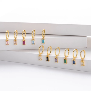 Colorful baguette-cut zircon huggie earrings in 11 shades on white geometric steps