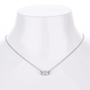 Detailed view of S925 silver necklace with rectangular clear zircon on a display stand