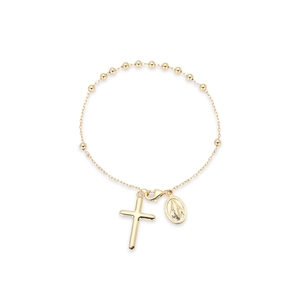 Détail d'un bracelet chapelet doré avec croix et médaille de saint et fermoir mousqueton