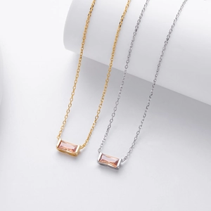 Detail of minimalist rectangular pink zircon pendants on gold and silver s925 necklaces