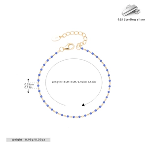Detailed close-up of S925 sterling silver bracelet with blue beads and 925 hallmark