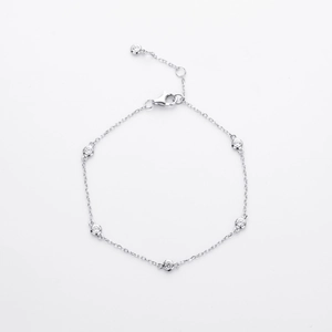 Minimalist S925 sterling silver bracelet with six bezel-set round cubic zirconia stones