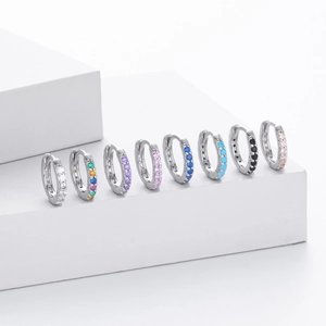 Detail showing S925 sterling silver stamp and colorful zirconia inlay on hoop earrings
