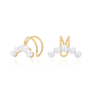 Detailed view of curved pearl ear cuff with five white pearls and golden frame