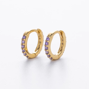 Detailed macro view of S925 silver gold-plated hoop earrings with purple zircon stones