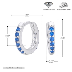 Detailed macro view of S925 sterling silver hoop earrings set with blue 5A grade zircon