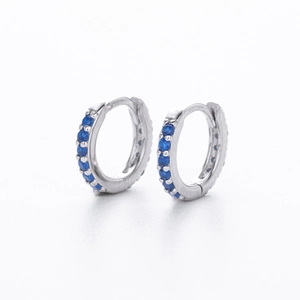 Detailed view of S925 sterling silver hoop earrings set with navy blue round zircons