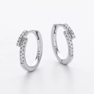 Minimalist S925 sterling silver hoop earrings with cubic zirconia inlay on white background