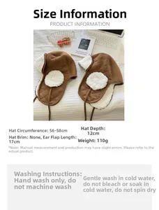 Brown faux suede aviator hat detail with lamb wool lining and specific size measurements