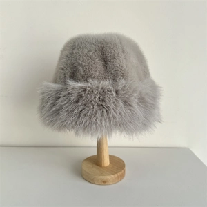 Plush grey faux fur bucket hat for winter warmth featuring thick fluffy faux fox hair fabric