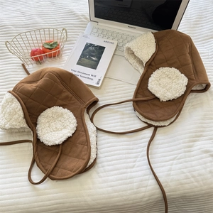 Winter faux suede aviator hat with thick lamb wool lining and warm ear flaps for cold weather