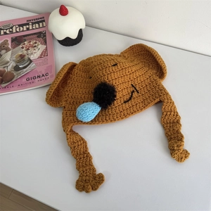 Cute koala handmade crochet knit hat in brown with earflaps and embroidery details