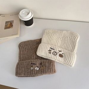 Cozy cat-ear knit beanie with apple embroidery in beige and brown colors for winter