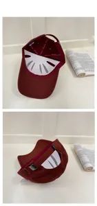 Vue détaillée d'une casquette bordeaux avec boucle en métal et doublure intérieure de qualité