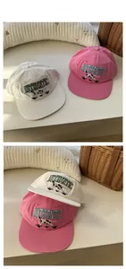 Close-up of high-density dalmatian and authentic embroidery on cotton baseball caps