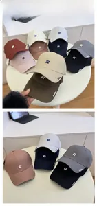 Detailed close-up of 3D letter R embroidery on premium cotton baseball cap