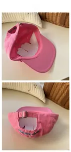 Pink cotton baseball cap with blue PP:ONE embroidery and adjustable metal buckle