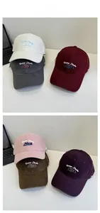 Detail display of cotton baseball caps with Yump Studio Nice embroidery in six colors