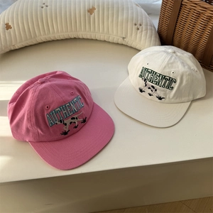 Retro cotton baseball caps in pink and beige featuring Dalmatian and text embroidery