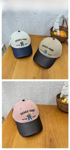 Close-up of cute bear embroidery and BEARS PARK text on a retro contrast baseball cap