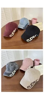 Multiple vintage washed cotton baseball caps with side letter embroidery and long brim