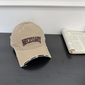 Retro khaki cotton baseball cap with NECESSARY embroidery and distressed torn brim