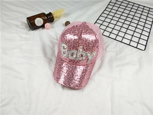 Detail of pink sequined baseball cap for babies with Baby pearl embroidery and mesh