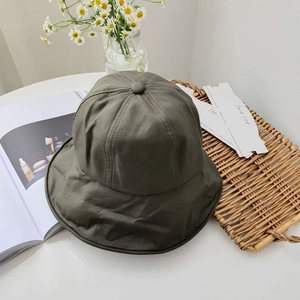 Detail view of foldable olive green fisherman hat with chic wide brim for sun protection