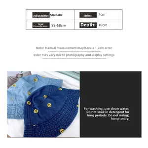 Size guide for denim bucket hat with yellow smile embroidery and washing instructions