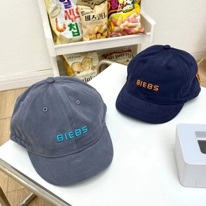 Minimalist soft top cotton baseball caps in grey and navy with BIEBS vintage embroidery