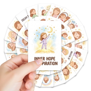 Macro view of watercolor healing affirmation cards with Dream and Breathe text