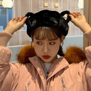 Cute white plush beret with bunny ears and pink parka jacket for winter fashion