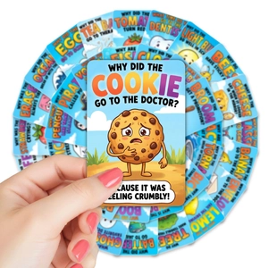Detailed fan layout of 36 colorful lunch box joke cards with fun cartoon illustrations