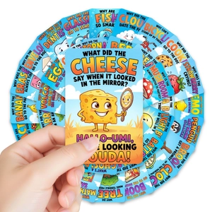Fan-shaped spread of 36 colorful lunchbox joke cards with puns and riddles for kids