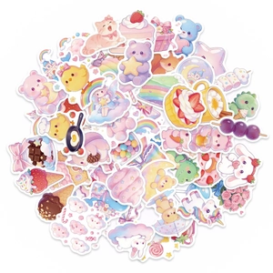 Macro view of 56 pink candy animal stickers with cute cats and bears for scrapbooking