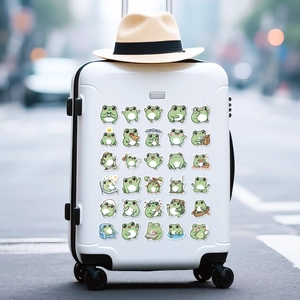 Waterdichte schattige cartoon kikker stickers op een witte koffer voor personalisatie