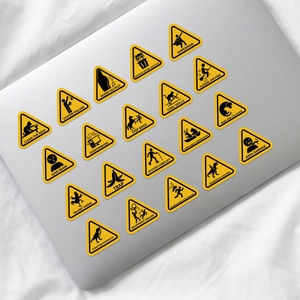 Close-up of funny warning stickers with Overthinking phrases on laptop lid