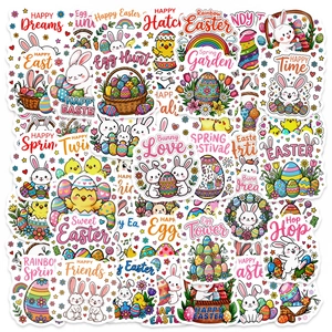 Flat lay display of colorful Easter bunny stickers with egg and flower designs